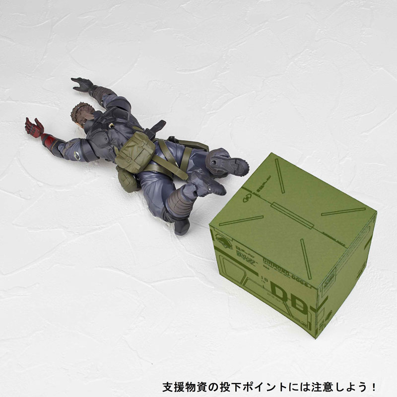 La figurine Vulcanlog de Venom Snake en Sneaking Suit illustre et date